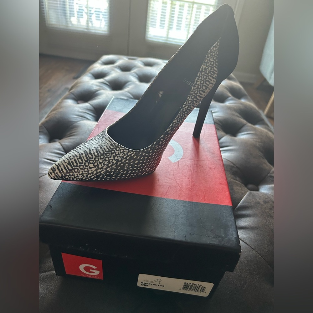 Guess women’s high heel shoe.